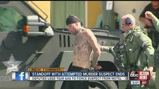 Standoff with attempted murder suspect ends