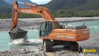 Doosan DX300 Excavator Digging Gravel Under Water