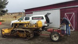 Caterpillar D2 powering 25 kw Winpower