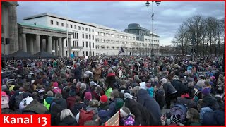 Several organizations stage a protest at the Brandenburg Gate