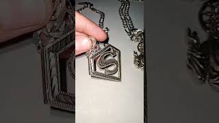 Solid 925 Sterling Silver Diamond-cut Superman pendant on a 8mm Figaro chain.