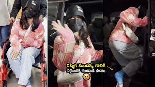 Rashmika Mandanna Latest Visuals Spotted in Wheel Chair After Leg Injury at Hyderabad Airport