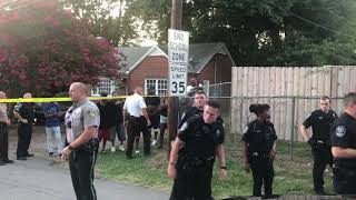 Crowd confronts police following car chase