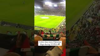 Celtic fans wave Palestine flags during rendition of You’ll Never Walk Alone