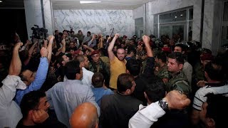 Dozens of journalists attacked at Kurdish parliament clash