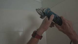 It’s Quicker To Strip Tiles and Wallboard in One Go