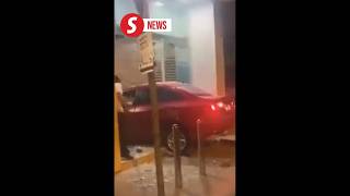 Drunk, unlicensed motorist crashes into bank door in Tawau