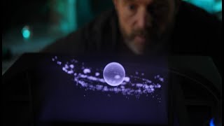 Simulation of gravitational effects between celestial bodies on a 3D volumetric display