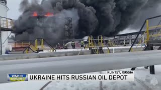 A Ukrainian drone attack on an oil depot inside Russia causes a massive blaze, officials say