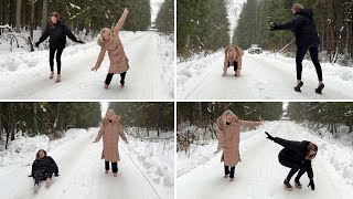 Two girls BAREFOOT comparing seven pairs of high heels on very slippery ice and snow (# 1517)