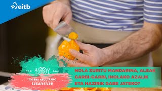 Nola zuritu mandarina, aleak garbi-garbi, inolako azalik eta hazirik gabe jateko?