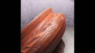 Ceramic casserole with a lid. Handmade from red clay. Carved pattern