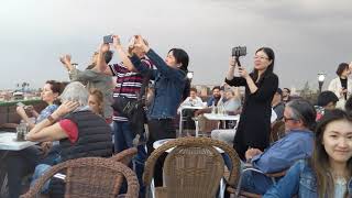 Sunset rooftoop vista 02 over Jemaa-el-Fnaa market in Marrakech, Morocco, 2019-03-16