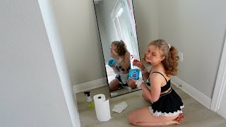 Mirror Cleaning in a Maid Outfit