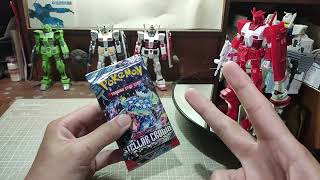 Opening up the latest Pokemon TCG card pack.