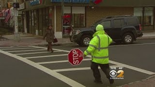 Crossing Guard Risks Life