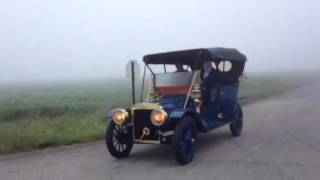 Two 1907 Ford Model K driving in fog