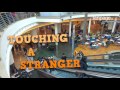 What happens when you touch a stranger on the escalator