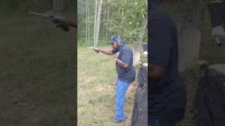 Automatic 9mm Beretta pistol at a machine gun shoot.