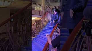 Edna Mode walks the staircase aboard the Disney Fantasy! #disney #disneycruiseline #pixardayatsea