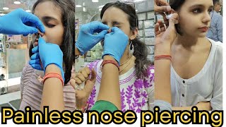 Painless nose piercing with silver stud /earpiercing with gun pain/trending/