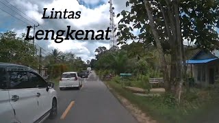 Melintasi jalan Desa Lengkenat