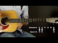 open g tuning made easy for beginners guitar tricks