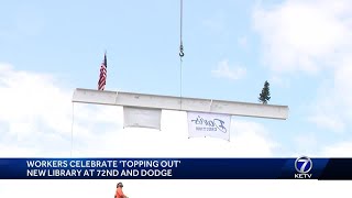 Workers celebrate 'topping out' new library 72nd and Dodge streets