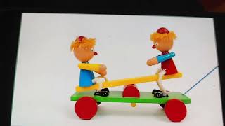 teeter totter Boys Pull Toy music Boccherini String Quintet In E Major Minuetto