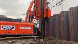 RTG RG21T telescopic leader rig with MPZ sheet pile press installing piles in London