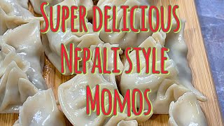 Nepali style steamed momos with homemade tomato sauce