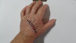 Drawing a Scar on the Hand. Halloween Inspiration
