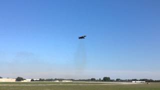 VMA-214 Blacksheep AV-8B Harrier hovers and lands in the early evening at AirVenture '15