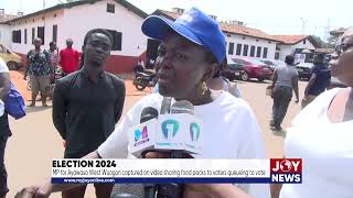 Election 2024: MP for Ayawaso West captured on video sharing food packs to voters queueing to vote