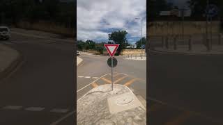 OBSERVE HOW A BMW DRIVER VIOLATES ROUNDABOUT RULES . SHEER RECKLESSNESS. SAFETY ALLIANCE.