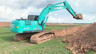 งาน 1 ล้าน คิว จัดเต็มอุ้ม เล่นสุดบูม #KOBELCO SK200-10Smมีเหนียว เปิดบ่อลึก excavator and truck