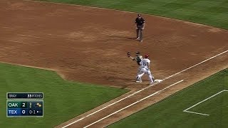 Lowrie starts the double play to retire side