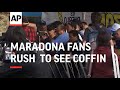 Maradona fans try to rush Casa Rosada to see coffin