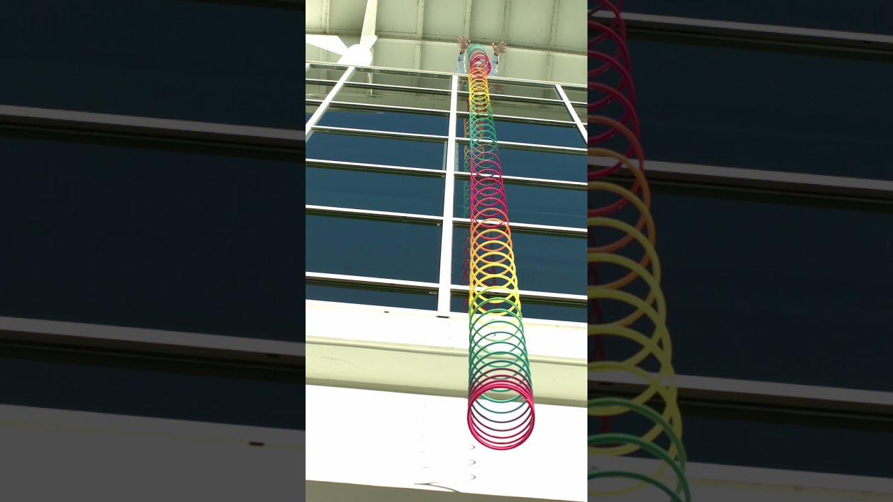 How A Slinky Falls In Slow Motion Shorts Youtube