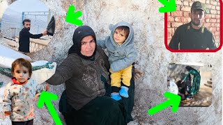 Mother and 10-month-old baby in a cave in the cold winter #motherlylove