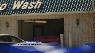 KPD: Car wash employee hits co-worker with customer's truck