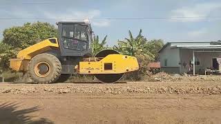 Leveling Road by Motor Grader and Roller