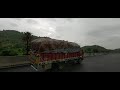 cloudy rainy greenary and mountainous way