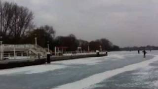 First steps on frozen Lake Alster (Außenalster) ice in Hamburg, Germany Feb 2012