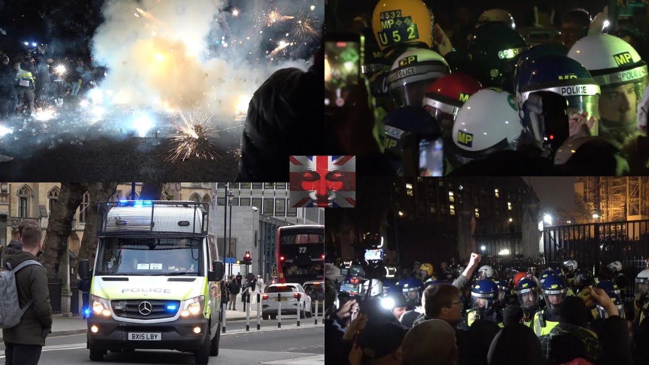 'Million Mask March' Protesters Clash With Riot Police, Fireworks ...