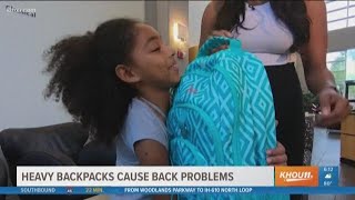 BACK TO SCHOOL: Heavy backpacks cause back problems