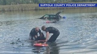 Officers rescue woman from car in LI river: police