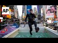 US Navy divers play underwater tic tac toe in Times Square