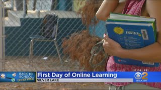 Lausd Students Pick Up Textbooks Hunker Down For Remote Learning
