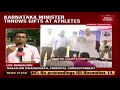 k taka mantri sparks row throws sports kits at athletes during felicitation